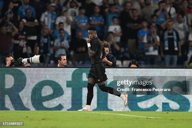 Vinicius Junior of Real Madrid celebrates after scoring the team's first goal during the UEFA Champions League match between SSC Napoli and Real...