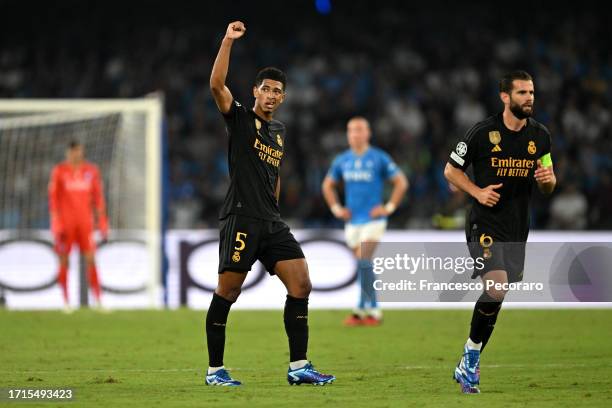 Jude Bellingham of Real Madrid celebrates after scoring the team's second goal during the UEFA Champions League match between SSC Napoli and Real...