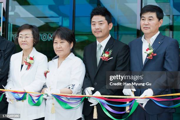 Mayor of Gangnam-Gu, Shin Yeon-Hee and comedian Kim Jun-Ho cut the ribbon at the Gangnam Tourist Information Center Grand Opening on June 26, 2013 in...