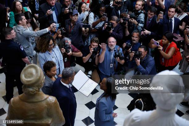Sen. Laphonza Butler is sworn in as a member of the Congressional Black Caucus by Chairman Rep. Steven Horsford in Statuary Hall at the U.S. Capitol...