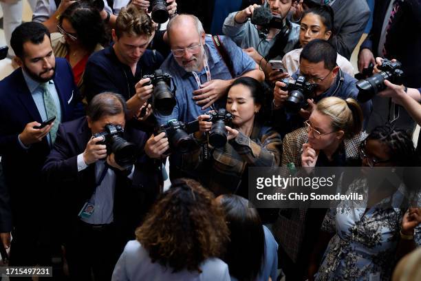 Photographers make images of Sen. Laphonza Butler after she was sworn in as a member of the Congressional Black Caucus in Statuary Hall at the U.S....