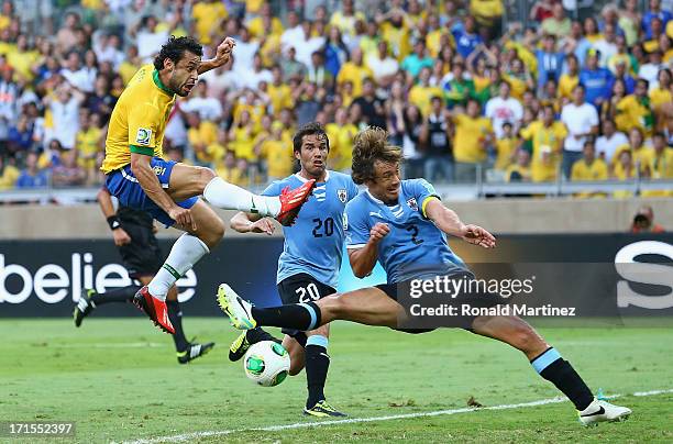 Fred of Brazil scores the opening goal during the FIFA Confederations Cup Brazil 2013 Semi Final match between Brazil and Uruguay at Governador...