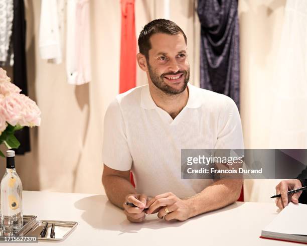 Fashion designer Simon Porte Jacquemus attends the "Jacquemus X Martin Parr" book signing as part of Paris Fashion Week at Jacquemus Montaigne on...