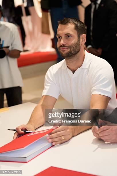 Fashion designer Simon Porte Jacquemus attends the "Jacquemus X Martin Parr" book signing as part of Paris Fashion Week at Jacquemus Montaigne on...