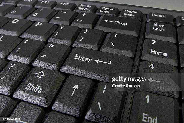 black laptop keyboard - enter key stock pictures, royalty-free photos & images