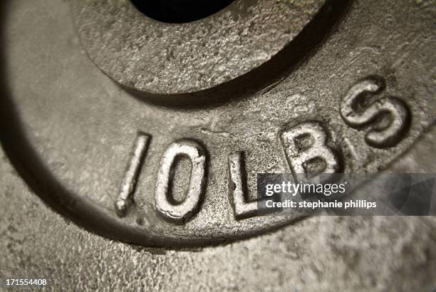 detail of a ten pound weight - pund massaenhet bildbanksfoton och bilder