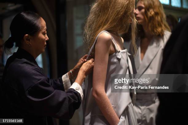 Model prepares backstage prior to the Ujoh Womenswear Spring/Summer 2024 show as part of Paris Fashion Week on October 03, 2023 in Paris, France.