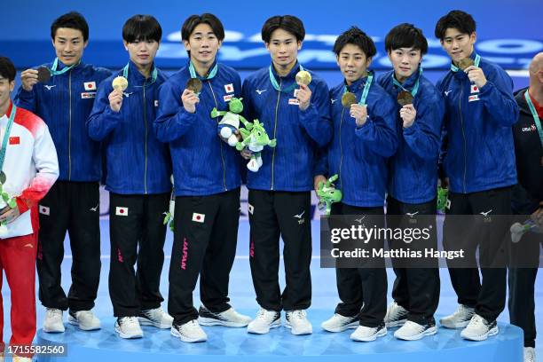 Team Japan pose with their Gold Medals after the Men's Team Final on Day Four of the 2023 Artistic Gymnastics World Championships on October 03, 2023...