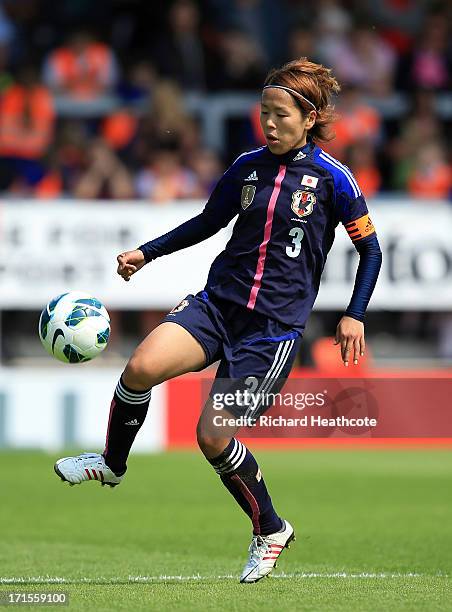 Azusa Iwashimizu of Japan in action during the Women's International match between England and Japan at the Pirelli Stadium on June 26, 2013 in...