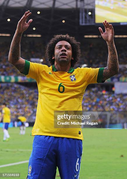 Marcelo of Brazil celebrates the opening goal during the FIFA Confederations Cup Brazil 2013 Semi Final match between Brazil and Uruguay at...