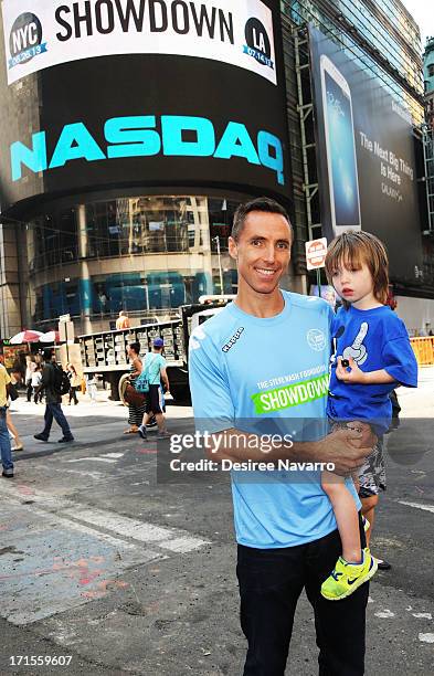 Steve Nash, Showdown Founder and President of the Steve Nash Foundation with son Matteo Joel Nash visit at NASDAQ MarketSite on June 26, 2013 in New...