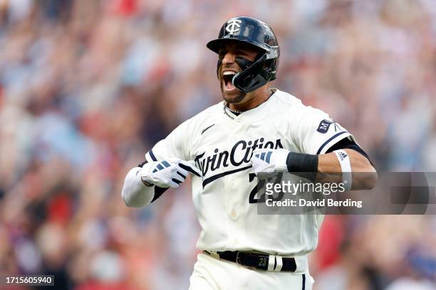 Royce Lewis of the Minnesota Twins celebrates after hitting a two run home run against Kevin Gausman of the Toronto Blue Jays during the first inning...
