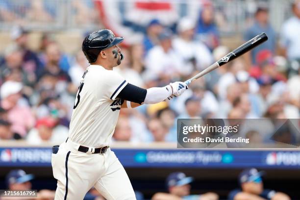 Royce Lewis of the Minnesota Twins hits a two run home run against Kevin Gausman of the Toronto Blue Jays during the first inning in Game One of the...