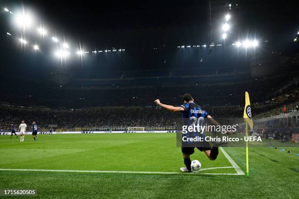 Hakan Calhanoglu of Inter Milan takes their sides corner during the UEFA Champions League match between FC Internazionale and SL Benfica at Stadio...