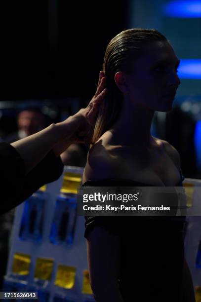 Model prepares backstage prior to the Avellano Womenswear Spring/Summer 2024 show as part of Paris Fashion Week on October 03, 2023 in Paris, France.