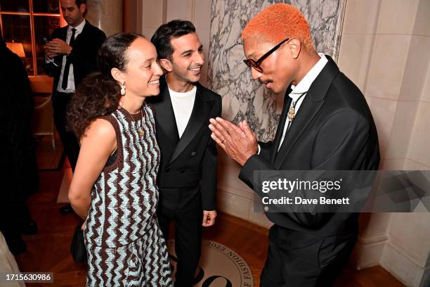 Grace Wales Bonner, Imran Amed and Pharrell Williams attend the #BoF500 Gala during Paris Fashion Week at Shangri-La Hotel Paris on September 30,...