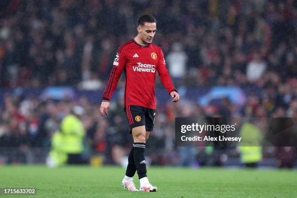 Antony of Manchester United looks dejected following the team's defeat during the UEFA Champions League match between Manchester United and...