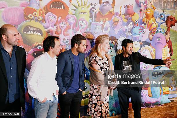 Xavier Fagnon , Eric Metayer , Malik Bentalha , Actress Catherine Deneuve and Humorist Jamel Debbouze pose at 'Monsters University' Paris movie...