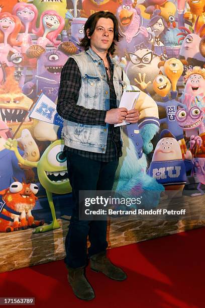 Singer Benjamin Biolay poses at 'Monsters University' Paris movie premiere, held at La Sorbonne on June 26, 2013 in Paris, France.