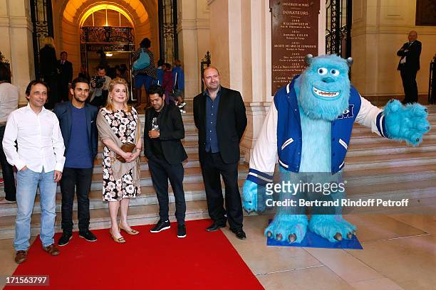 Eric Metayer , Malik Bentalha , Actress Catherine Deneuve and Humorist Jamel Debbouze and Xavier Fagnon pose at 'Monsters University' Paris movie...