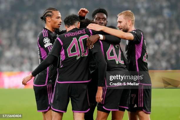 Mathys Tel of Bayern Munich celebrates with teammates Leroy Sane, Noussair Mazraoui, Jamal Musiala, Konrad Laimer and Alphonso Davies after scoring...