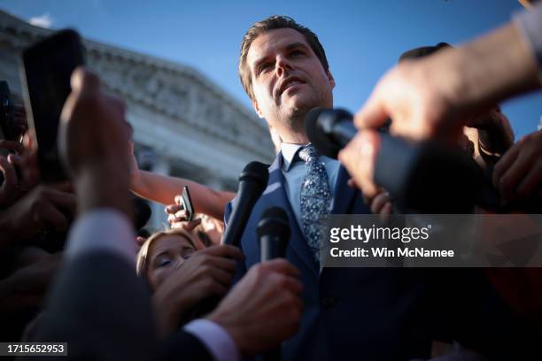 Rep. Matt Gaetz answers questions outside the U.S. Capitol after successfully leading a vote to remove Rep. Kevin McCarthy from the office of Speaker...
