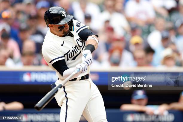 Royce Lewis of the Minnesota Twins hits a solo home run against Kevin Gausman of the Toronto Blue Jays during the third inning in Game One of the...