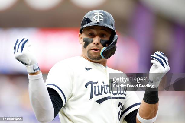 Royce Lewis of the Minnesota Twins celebrates after hitting a solo home run against Kevin Gausman of the Toronto Blue Jays in Game One of the Wild...