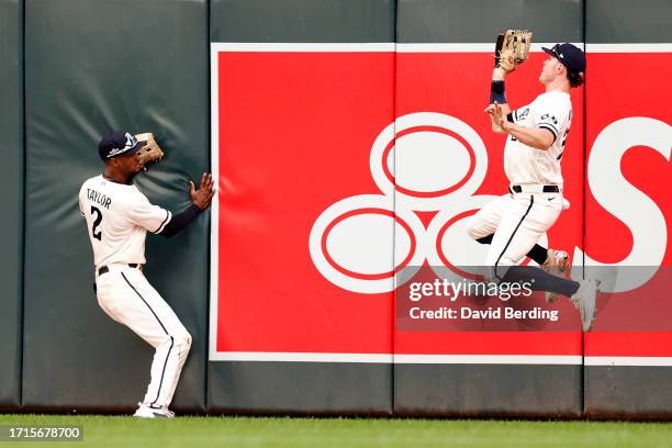 Max Kepler of the Minnesota Twins catches a fly ball hits a by Vladimir Guerrero Jr. #27 of the Toronto Blue Jays during the third inning in Game One...