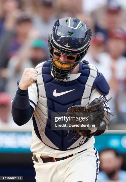Ryan Jeffers of the Minnesota Twins celebrates after tagging out Bo Bichette of the Toronto Blue Jays at home plate during the fourth inning in Game...