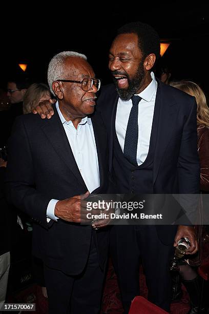 Sir Tevor McDonald meets actor Lenny Henry following his performance on press night of 'Fences' at the Duchess Theatre on June 26, 2013 in London,...