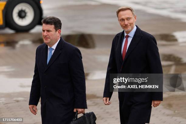 German Labour Minister and Deputy Chairman of Germany's Social Democrats SPD party Hubertus Heil and German Finance Minister Christian Lindner arrive...