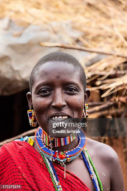 portrait of maasai woman in traditional dress and jevellery. - scarification stock pictures, royalty-free photos & images