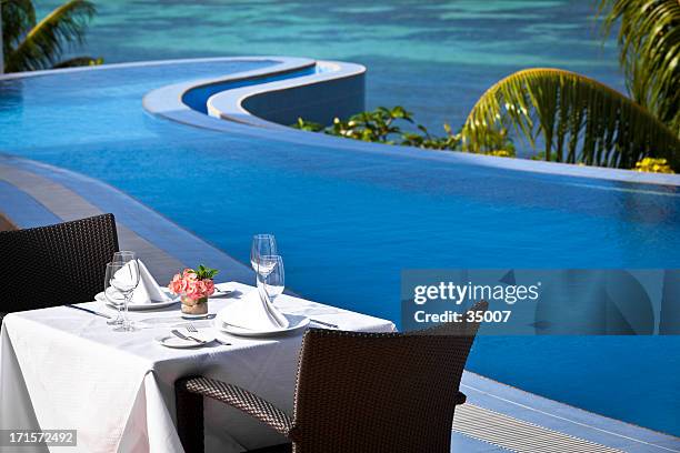 tropical fine dining table setting - waterfront dining stock pictures, royalty-free photos & images