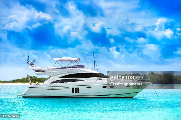 white yacht in the middle of the water - yacht stock pictures, royalty-free photos & images