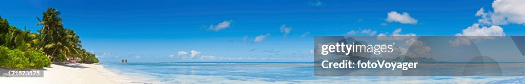 Paradise beach idyllic tropical island lagoon palm trees super panorama