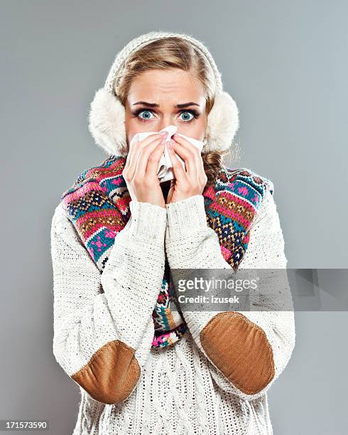 cold - ear muffs stock pictures, royalty-free photos & images