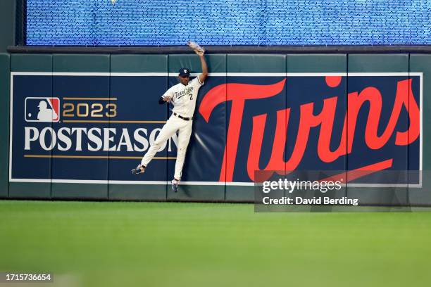 Michael A. Taylor of the Minnesota Twins catches a fly ball hits a by Matt Chapman of the Toronto Blue Jays during the sixth inning in Game One of...