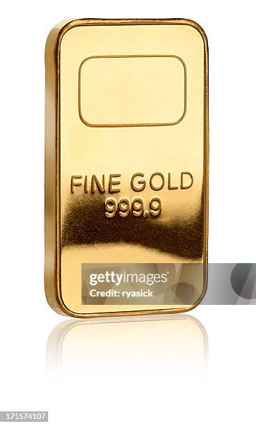 isolated pure gold ingot on white with clipping path - bullion stockfoto's en -beelden