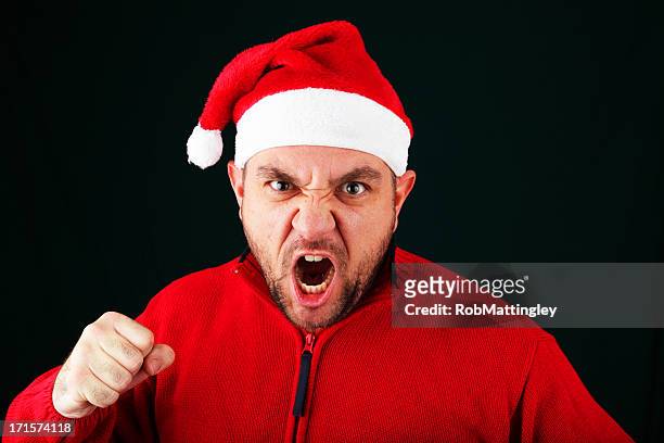 punchy santa - christmas angry stock pictures, royalty-free photos & images