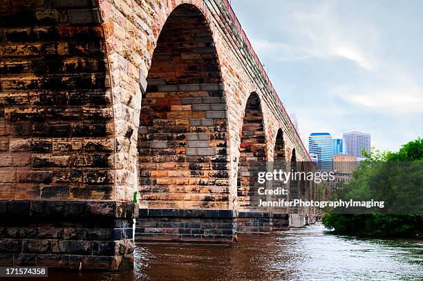 stone arch bridge - minneapolis downtown stock pictures, royalty-free photos & images