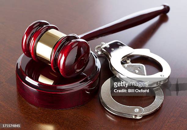 criminal law - handcuffs bildbanksfoton och bilder