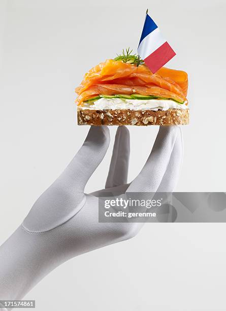 french smoked salmon sandwich - formal glove bildbanksfoton och bilder