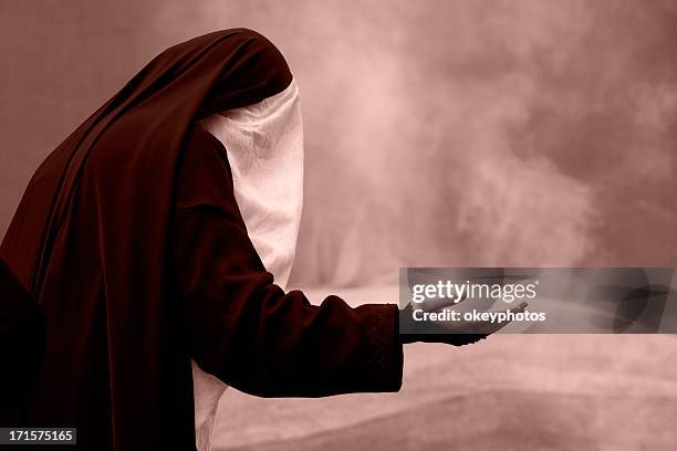 unrecognized muslim woman praying - muharram stock pictures, royalty-free photos & images