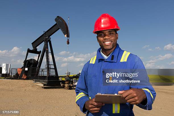 friendly oil worker - geologist stock pictures, royalty-free photos & images