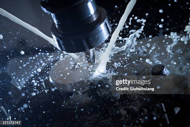 milling machine in operation(blurred motion). - cnc stock pictures, royalty-free photos & images