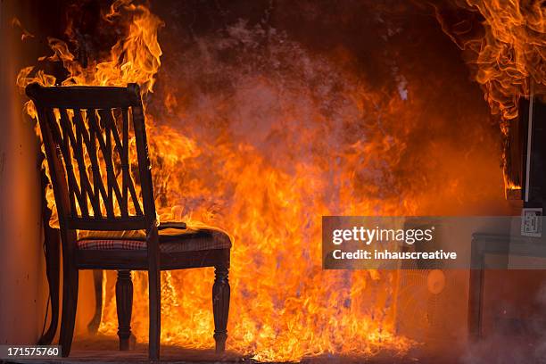 living room on fire - arson stock pictures, royalty-free photos & images