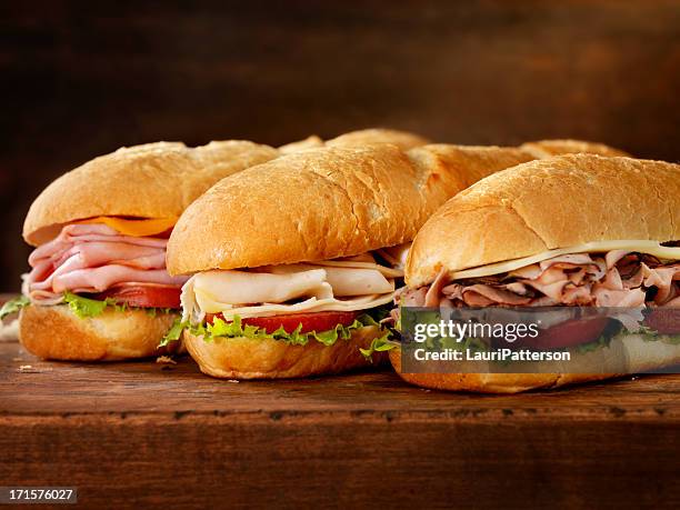 drei meter lange abonnements - sandwich stock-fotos und bilder