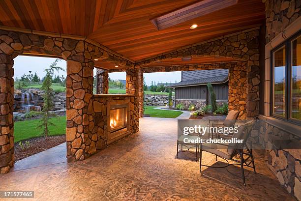 beautiful covered patio - stone patio stock pictures, royalty-free photos & images