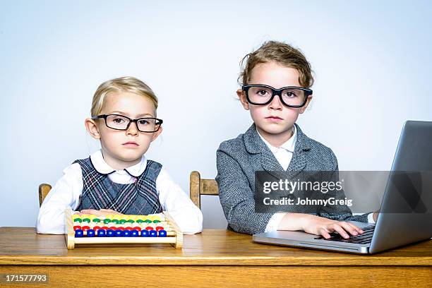 serious little accountants - abacus computer stock pictures, royalty-free photos & images